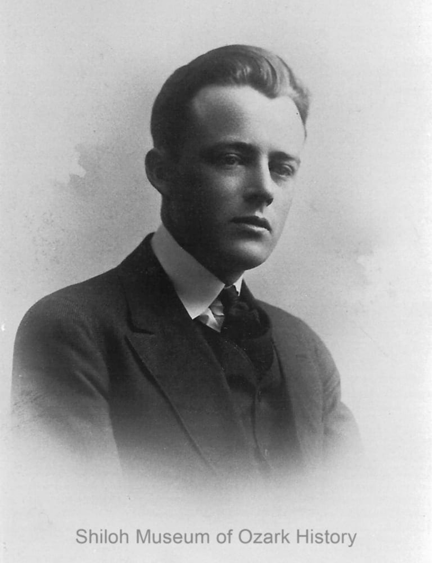 Young Vance Randolph in a dark suit, high collar, and tie. Shiloh Museum of Ozark History